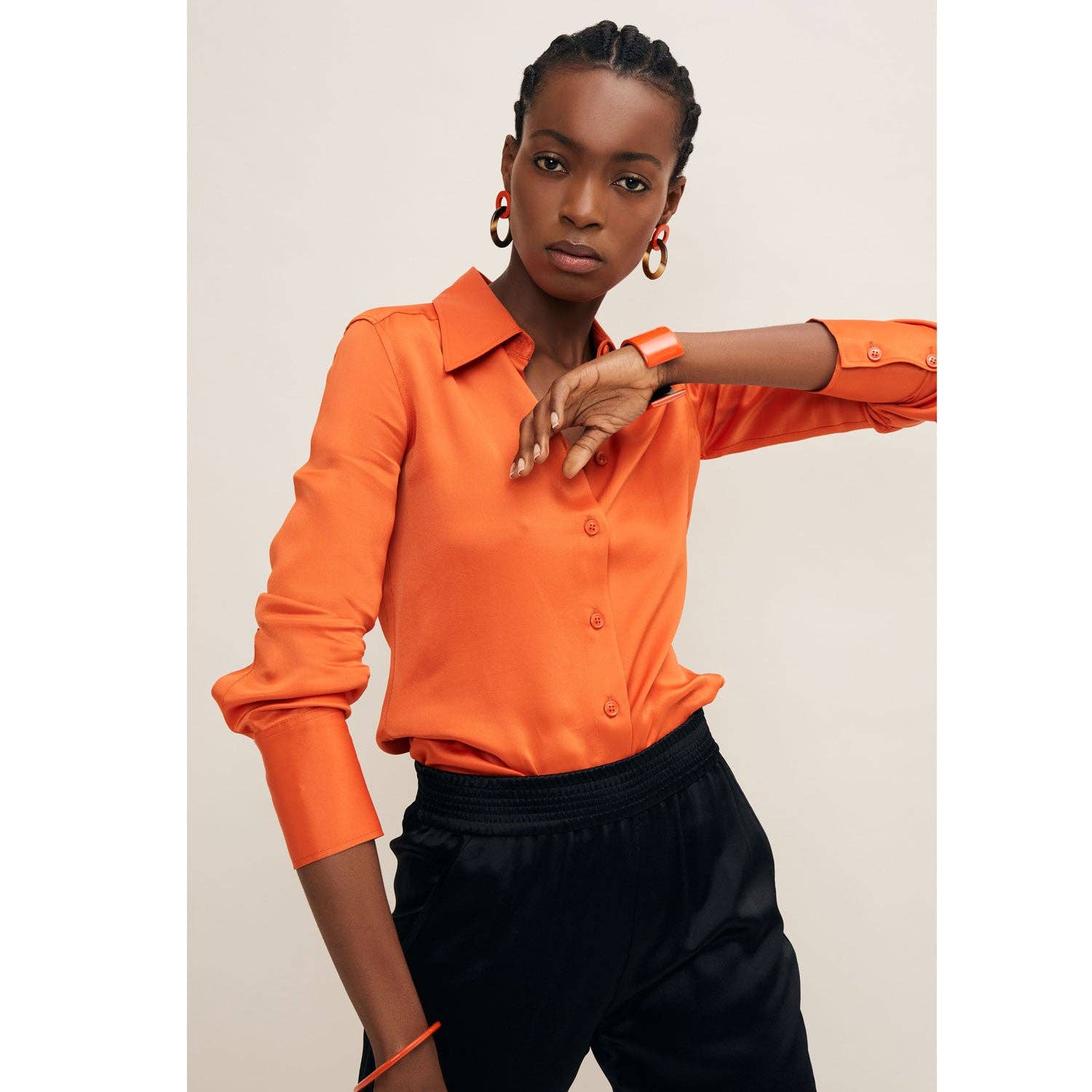 Small oval buffalo horn link earring –  Orange