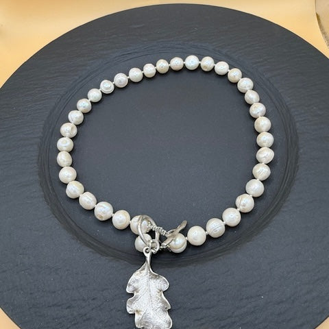 Freshwater pearl necklace with silver oak leaf