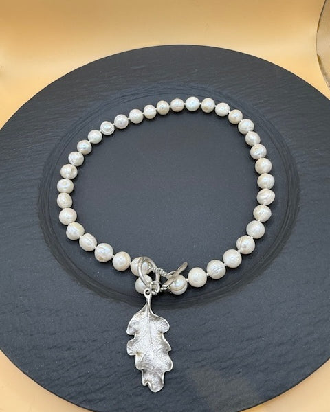 Freshwater pearl necklace with silver oak leaf