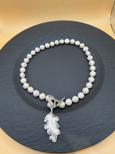 Freshwater pearl necklace with silver oak leaf