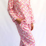 Patterned pajama set with long sleeves and pants on a white background