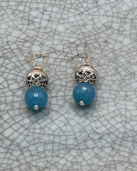 Blue faceted bead and silver ball earrings