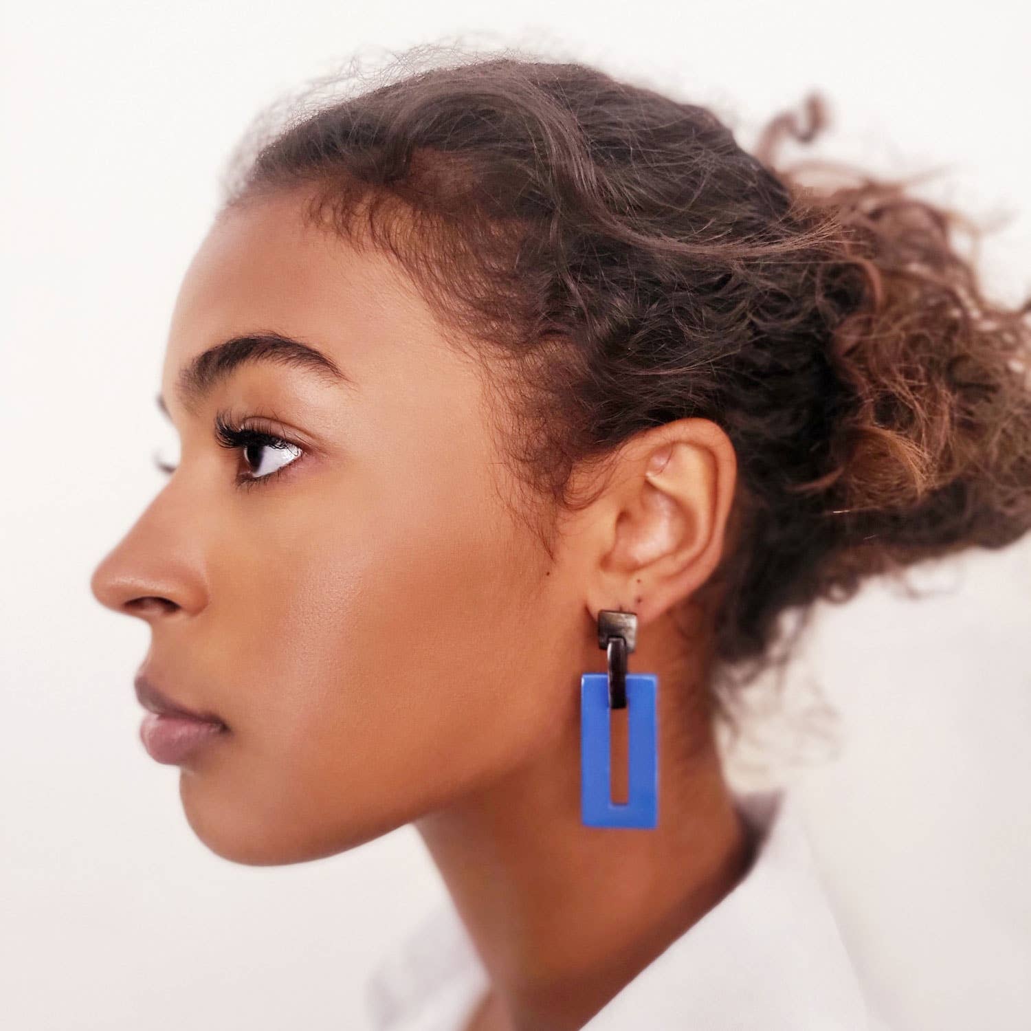 Bright blue and black rectangle link horn earrings