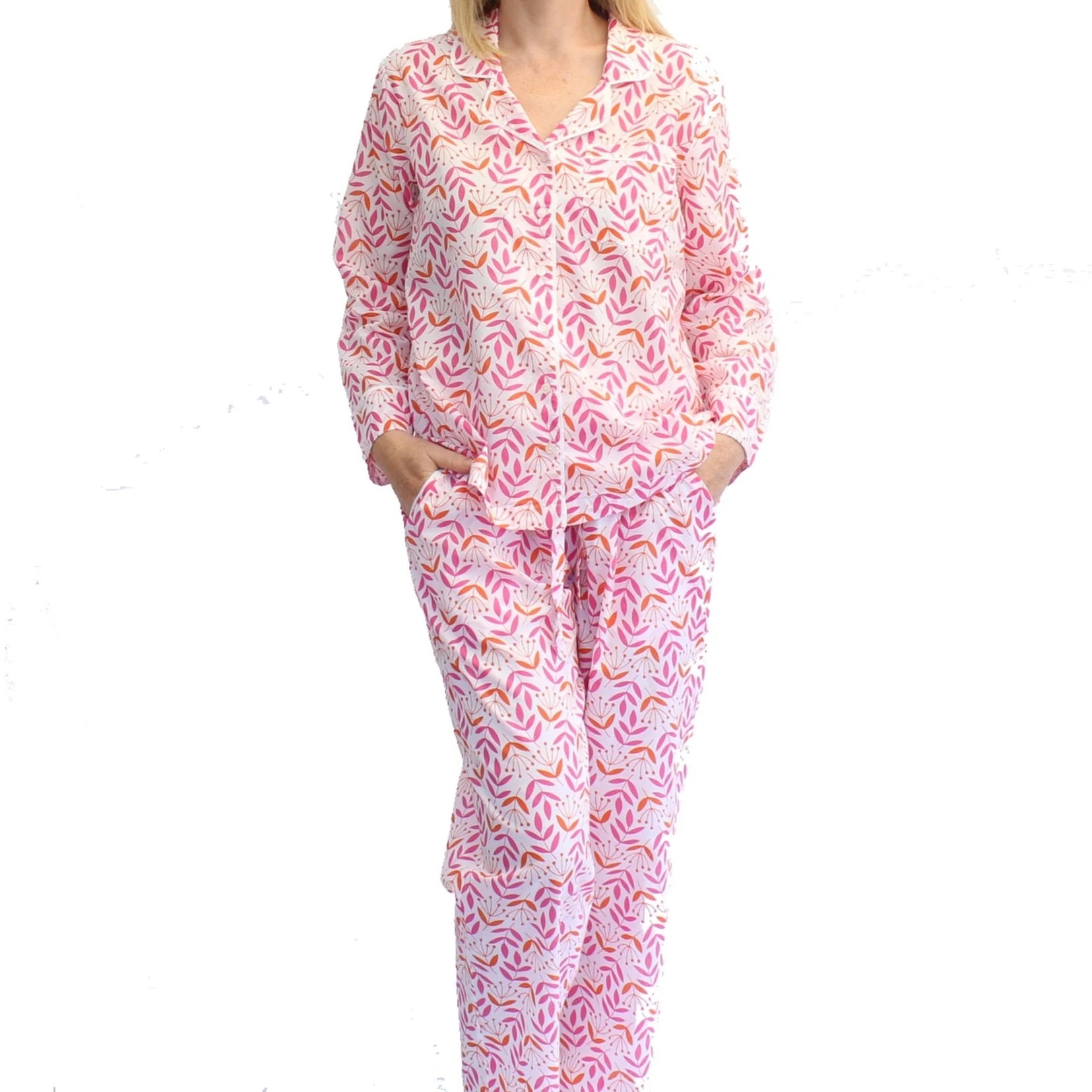 Pink patterned pajama set on a white background