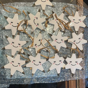 White Rain - Ceramic star with eyelashes