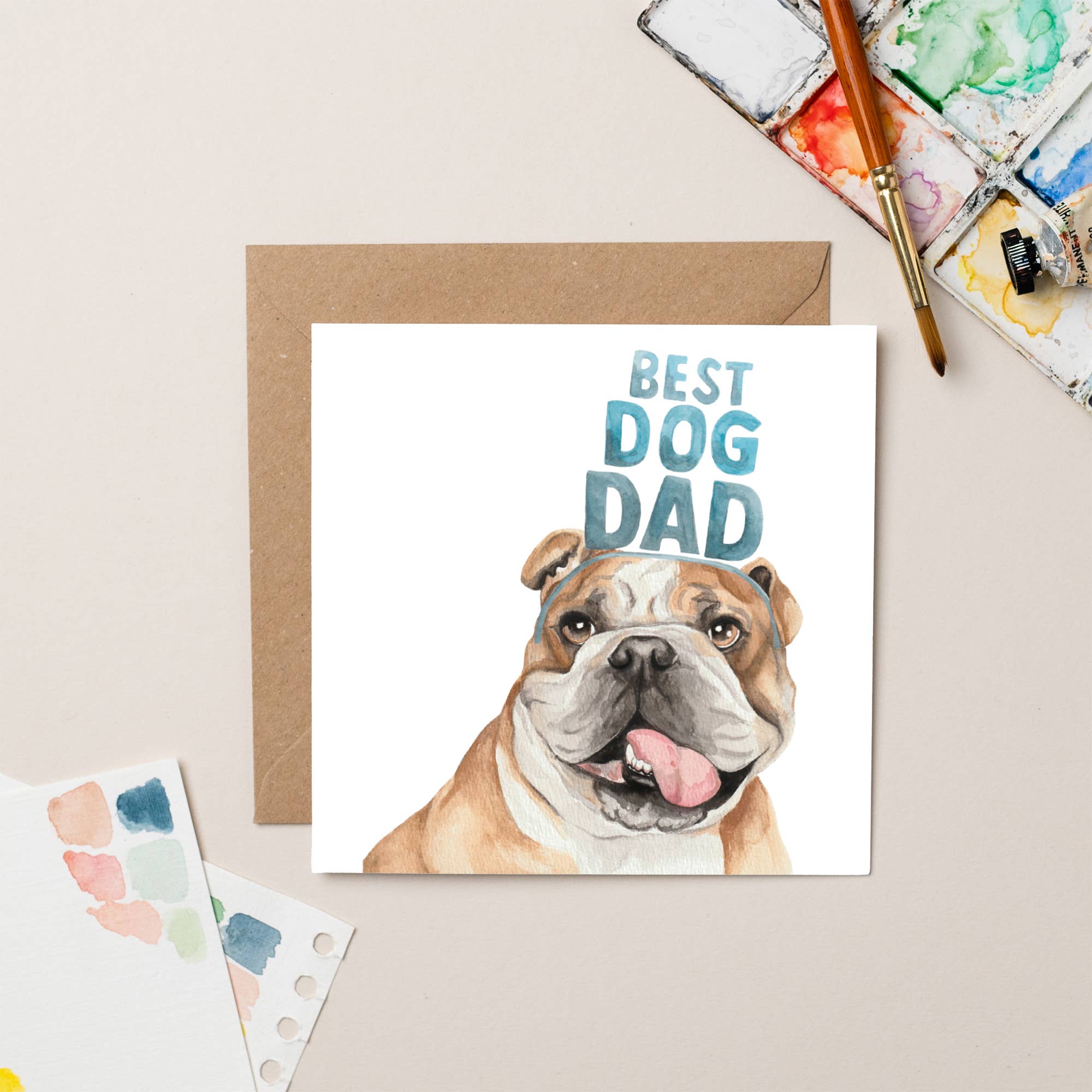 Card with a bulldog illustration and 'Best Dog Dad' text on a beige background