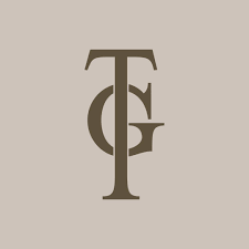 Monogram logo with interlocking letters on a beige background
