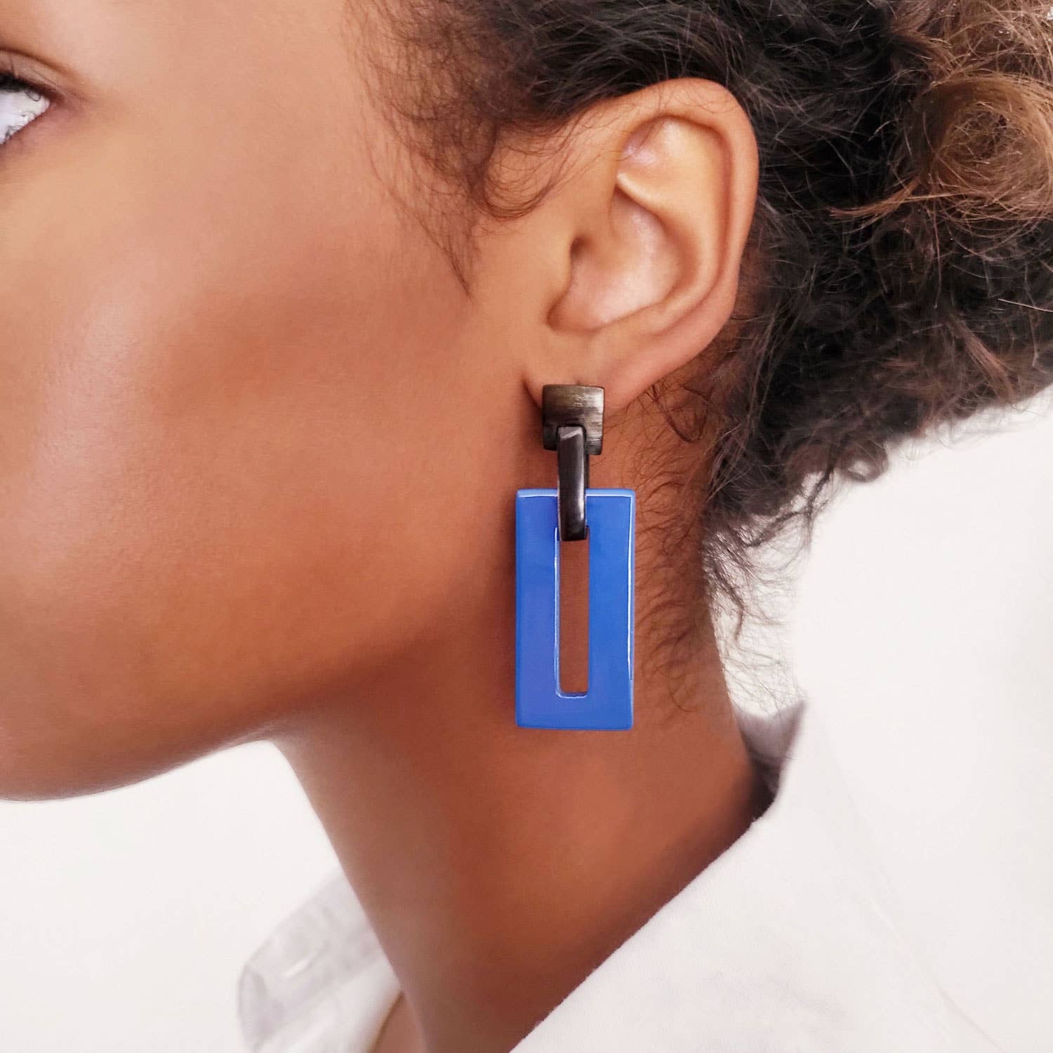 Bright blue and black rectangle link horn earrings