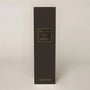 Black rectangular box with gold text on a light gray background