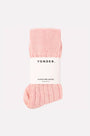 Pink bed socks with 'Yonder' label on a white background