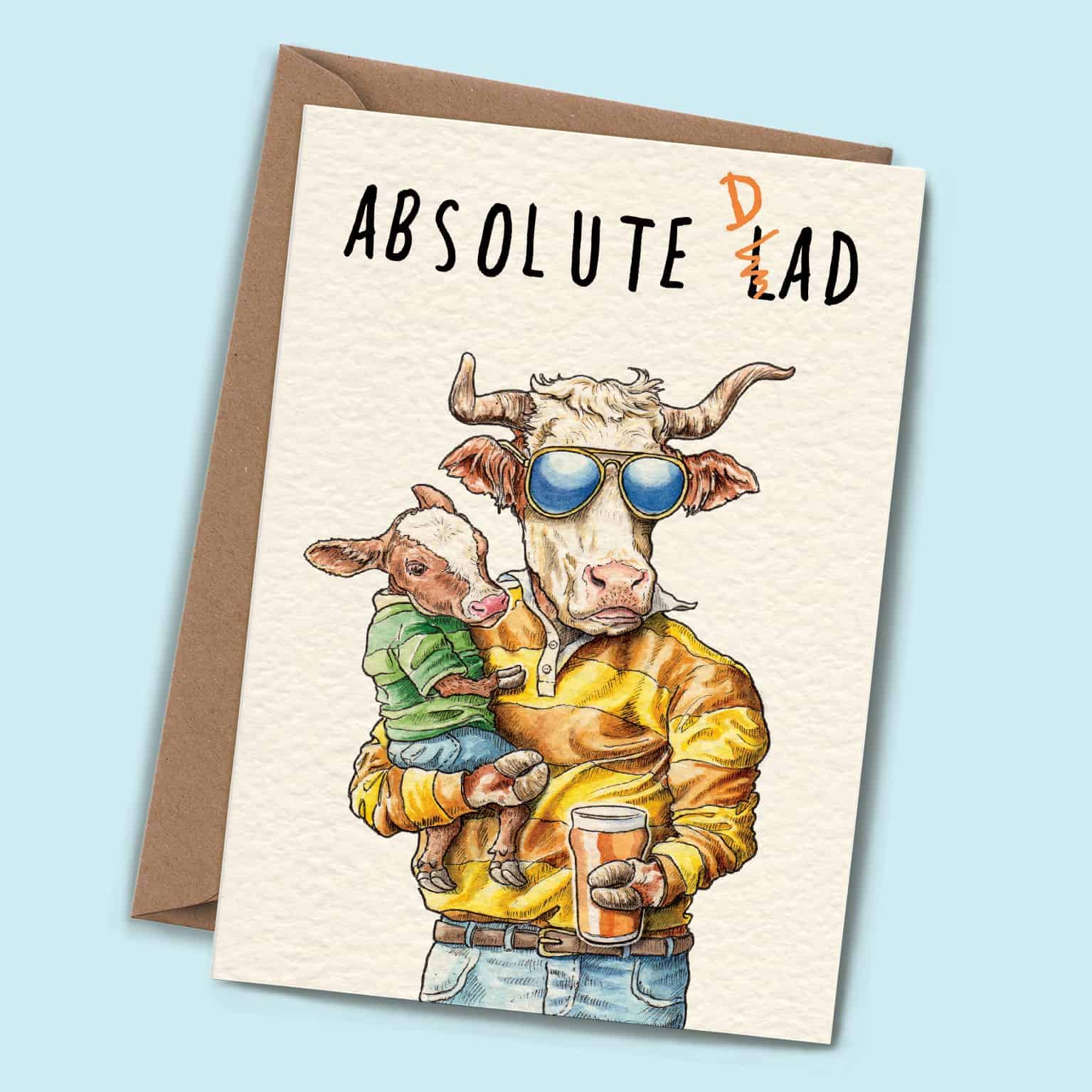 Card with illustration of a cow wearing sunglasses holding a calf, text 'Absolute Dad' on a light blue background.